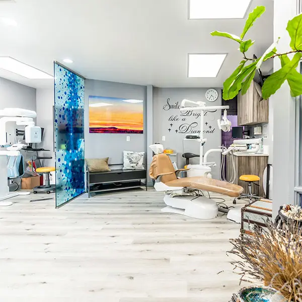 Dr. Jefferey Pham examining a patient at Diamond Coast Dental